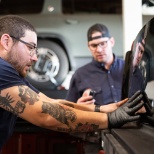 Service technicians at the Denver Rivian Service Center