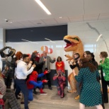 The IMS team worked as heroes, villains and dinos for Halloween